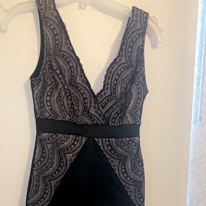 Black laced v neck body con dress